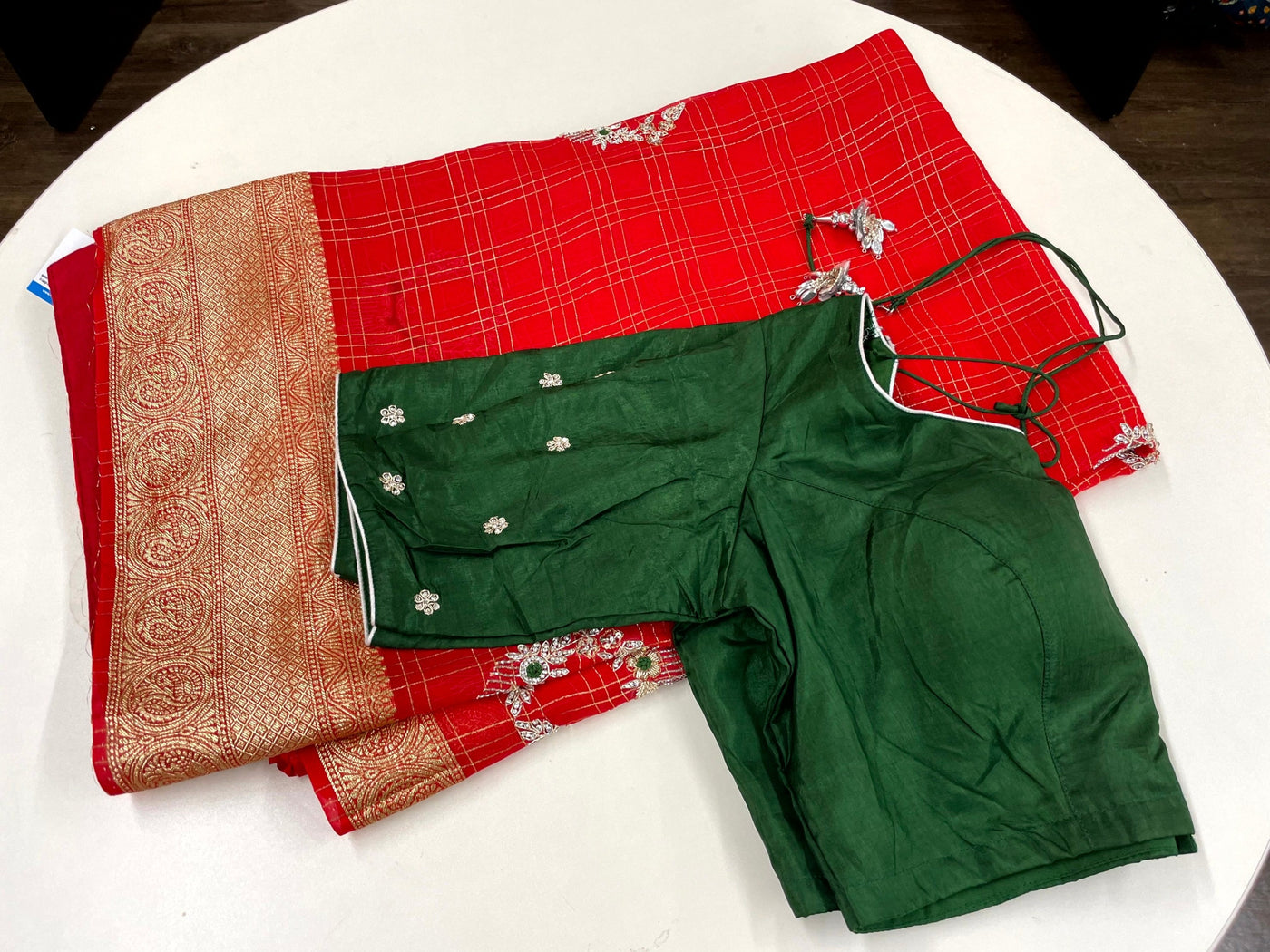 RED COLORED GEORGETTE SAREE WITH ZARI CHECKS PAIRED WITH GREEN BLOUSE