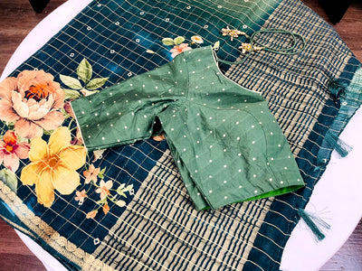 GREEN COLORED GEORGETTE SAREE WITH ZARI CHECKS AND FLORAL PRINTS PAIRED WITH BLOUSE