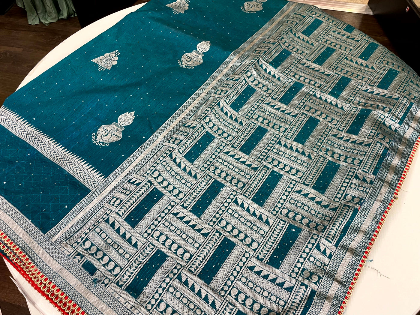 TURQUOISE COLORED TUSSAR SILK SAREE PAIRED WITH RED BLOUSE
