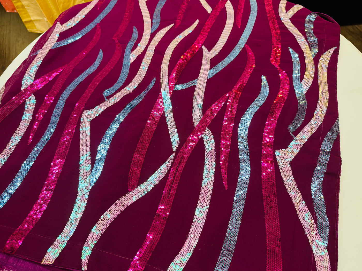 Vibrant Magenta Chiffon Saree with Multicolored Sequin Wave Patterns