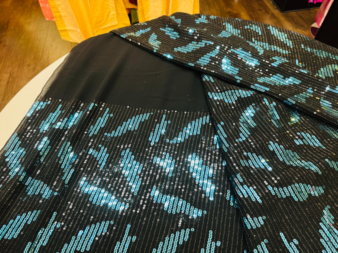 Dazzling Black Chiffon Saree with Blue Sequin Leaf Embellishments