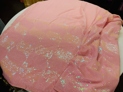 Enchanting Pink Chiffon Saree with Iridescent Sequin Embellishments