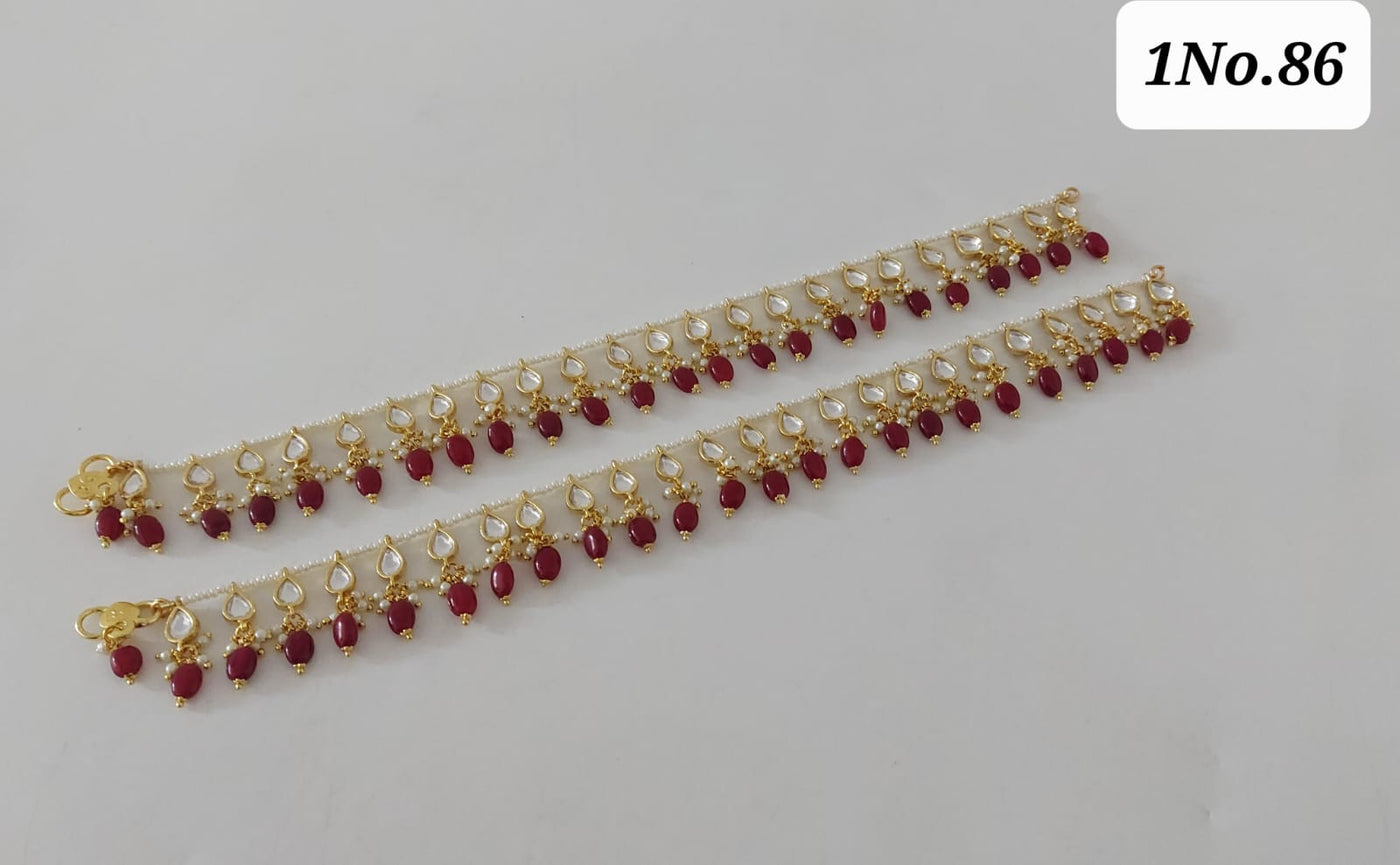 Red gemstone kundan anklet