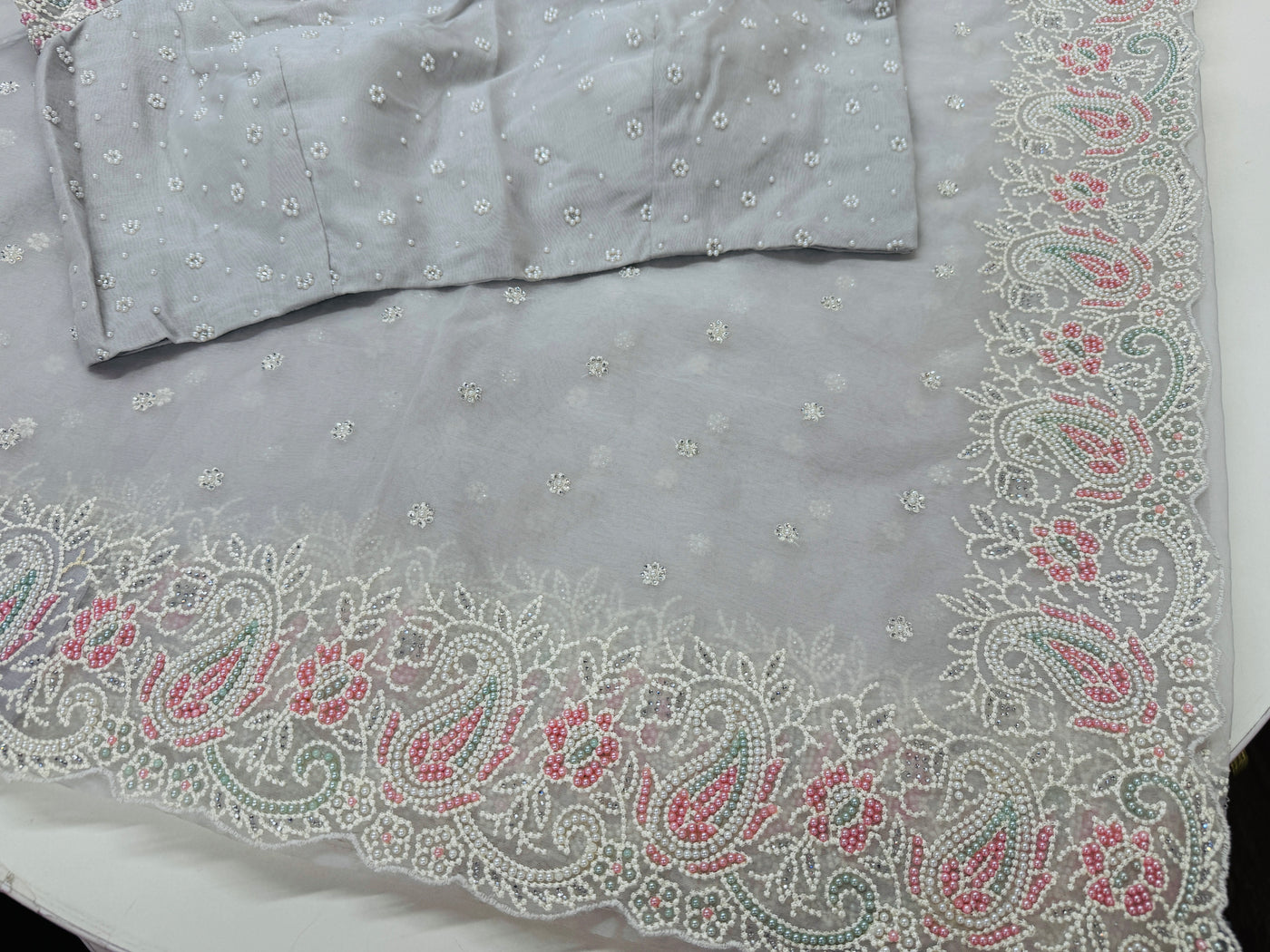 Powder grey embroidered Organza saree with stitched blouse