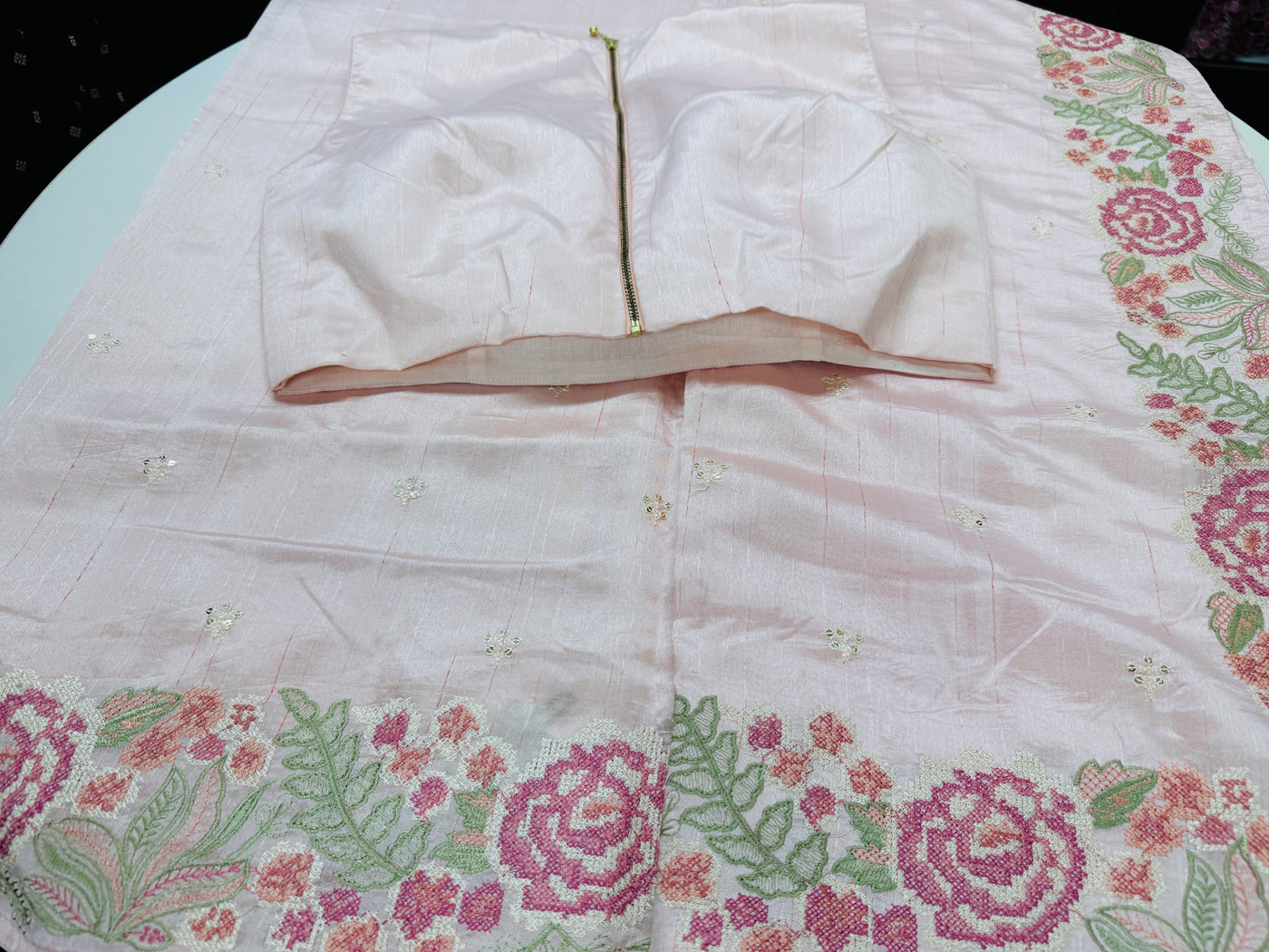 Powder pink semi tussar saree with stitched blouse