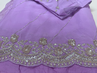 Powder purple embroidered georgette saree with stitched blouse