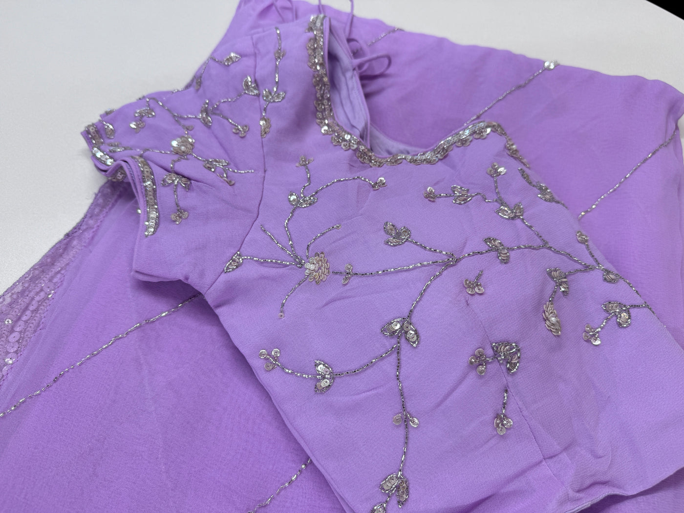 Powder purple embroidered georgette saree with stitched blouse