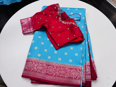 Sky blue Banarasi saree with stitched blouse