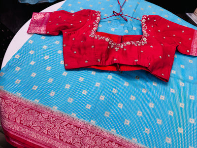 Sky blue Banarasi saree with stitched blouse