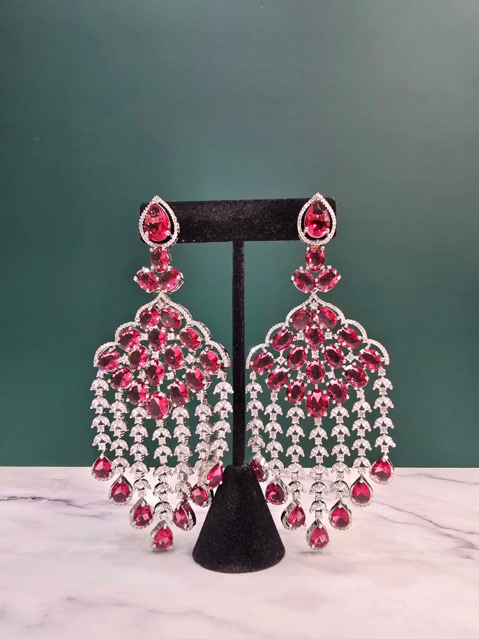 Red gemstone and moissanite earrings