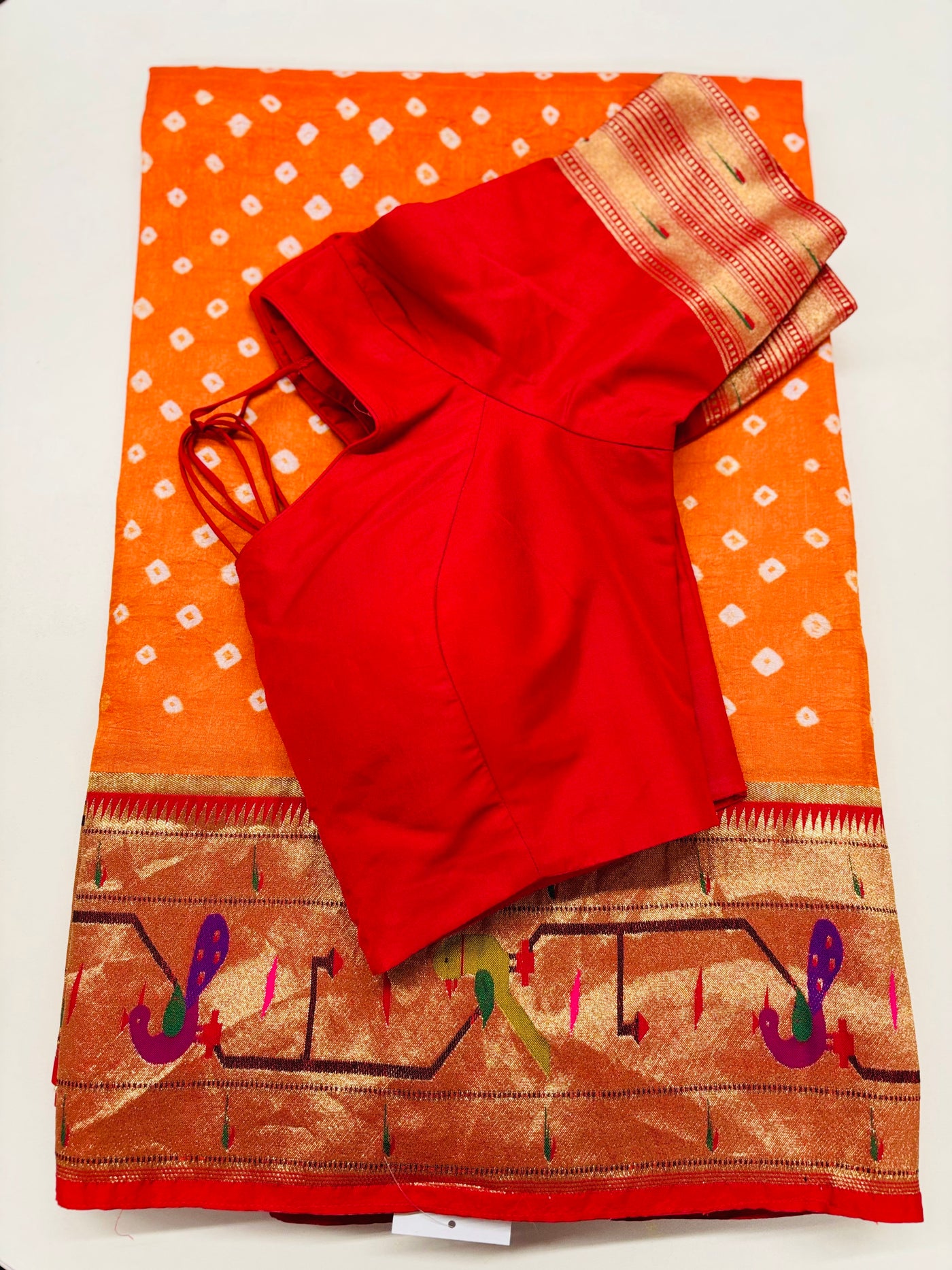 Orange Bandhani Saree with Traditional Paithani Parrot Border and Red Blouse