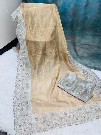 Golden Tissue Saree with Silver Floral Embroidery & High Neck Blouse
