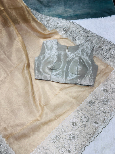 Golden Tissue Saree with Silver Floral Embroidery & High Neck Blouse