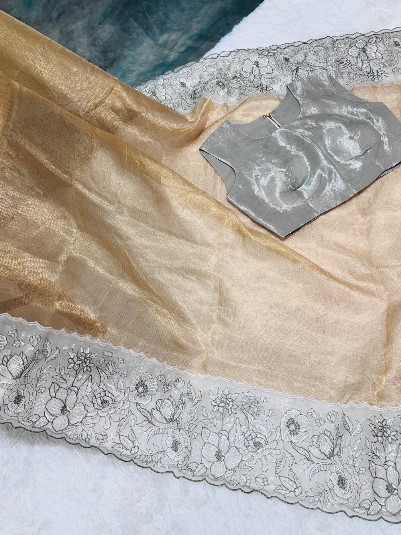 Golden Tissue Saree with Silver Floral Embroidery & High Neck Blouse