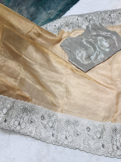 Golden Tissue Saree with Silver Floral Embroidery & High Neck Blouse