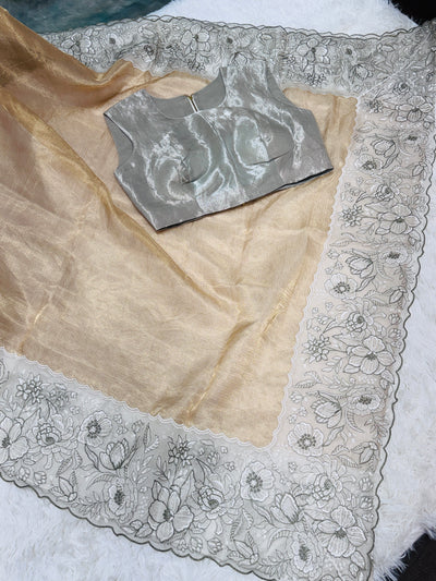 Golden Tissue Saree with Silver Floral Embroidery & High Neck Blouse