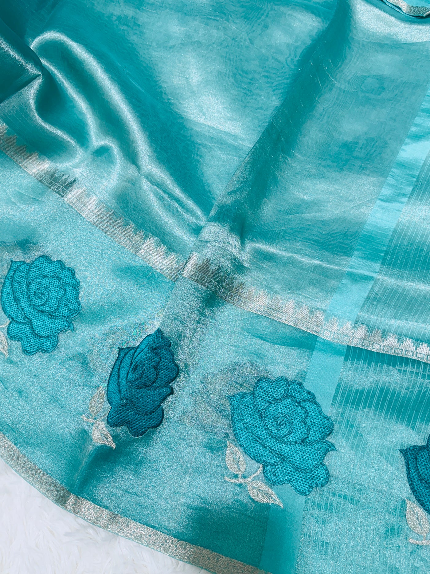 Teal Blue Banarasi Kora Silk Saree with Rose Motif Border & Matching Blouse