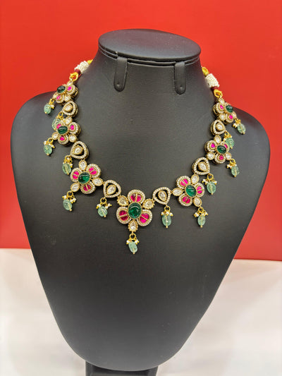 Floral Kundan Necklace Set with Green Beads & AD Stone Detailing