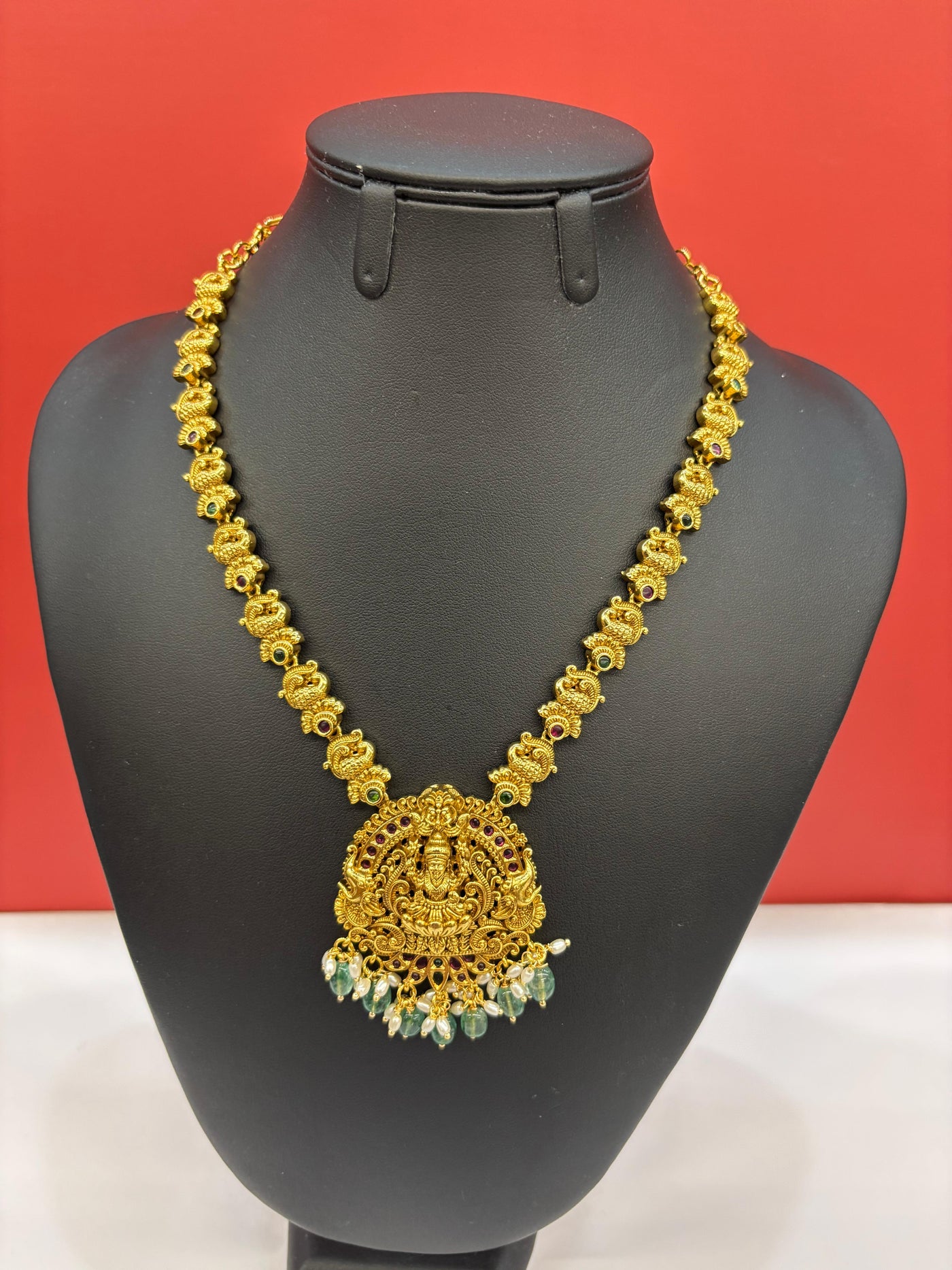 Antique Gold Temple Necklace Set with Goddess Lakshmi Pendant & Green Bead Drops