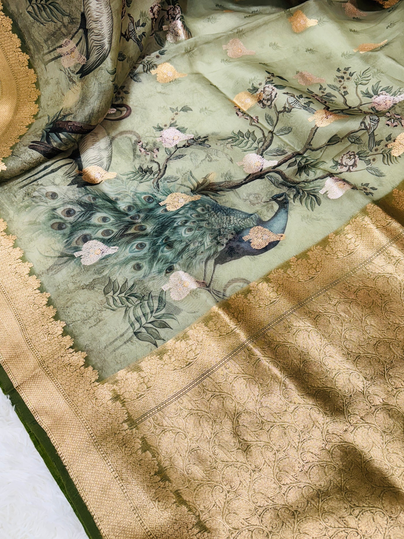 Banarasi Silk Saree – Olive Green with Bird & Peacock Design, Golden Zari Border, Paired with Matching Blouse