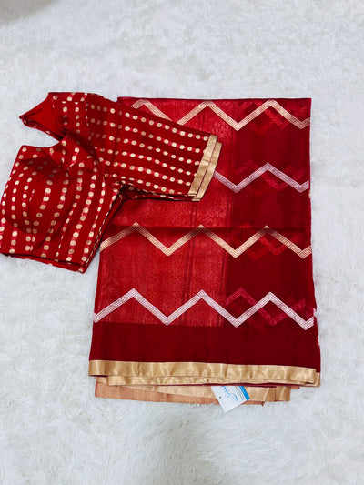 Banarasi Kora Silk Saree – Deep Red with Gold Zari Border & Geometric Pattern, Paired with Contrast Polka Dot Blouse