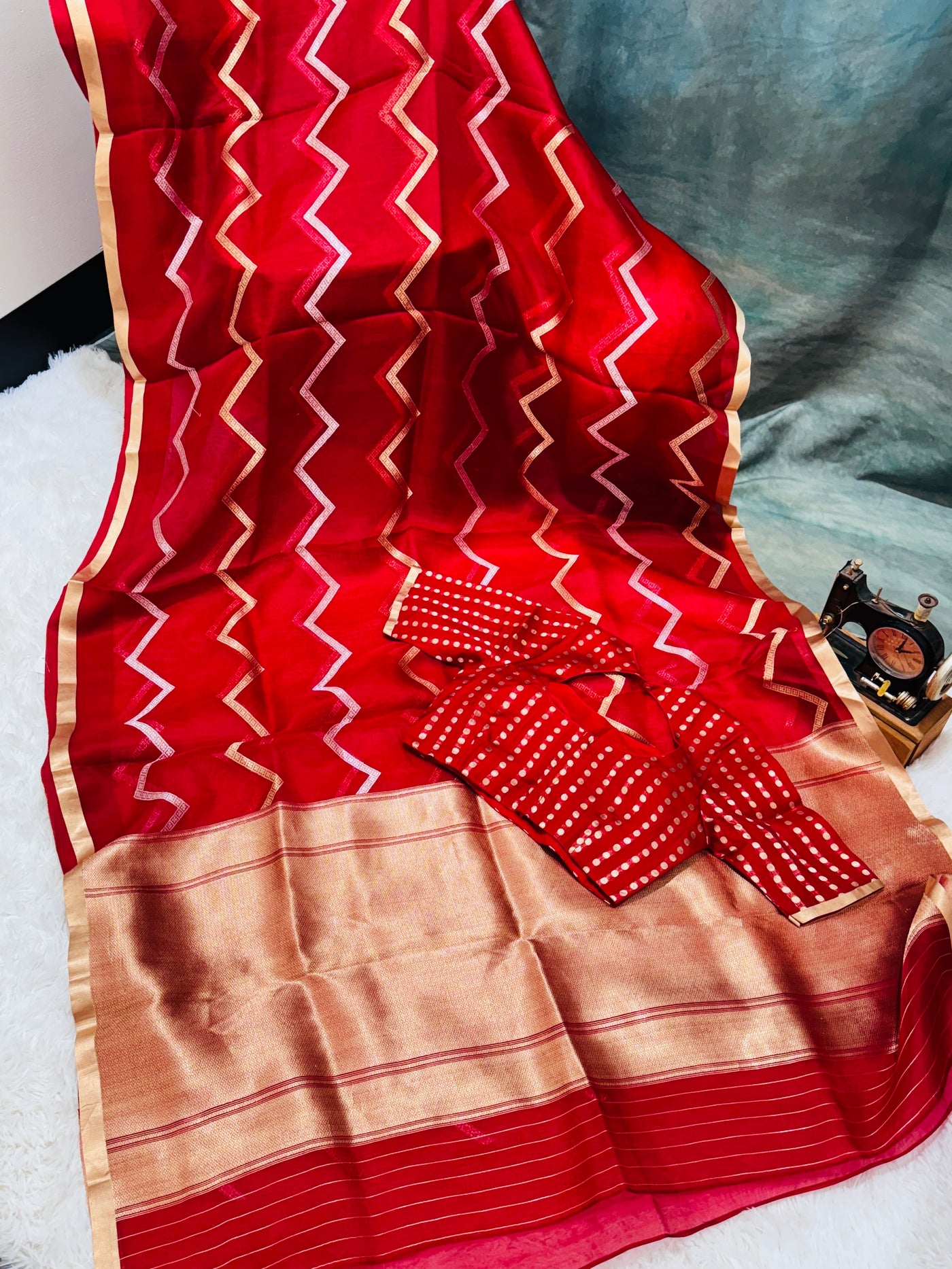 Banarasi Kora Silk Saree – Deep Red with Gold Zari Border & Geometric Pattern, Paired with Contrast Polka Dot Blouse