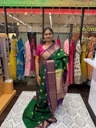 Kanchipuram Pure Silk Saree – Green with Purple Border & Gold Zari Weaving, Paired with Embroidered Purple Blouse