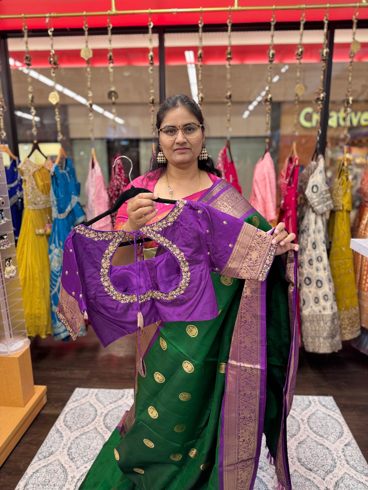 Kanchipuram Pure Silk Saree – Green with Purple Border & Gold Zari Weaving, Paired with Embroidered Purple Blouse