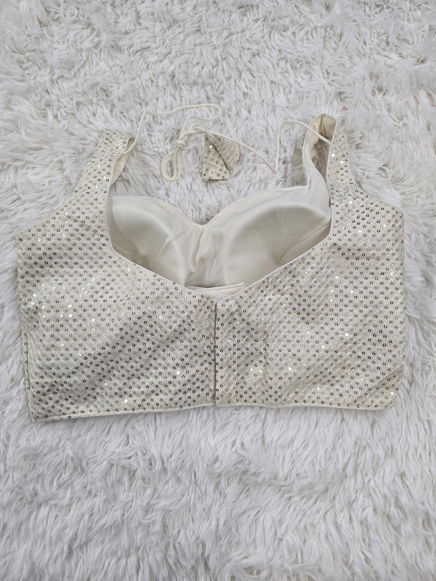 White Sequin Embroidered Sleeveless Blouse with Sweetheart Neckline & Extra Sleeve Fabric