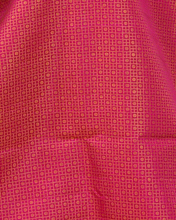 Berry pink Kanjeevaram saree with stitched blouse