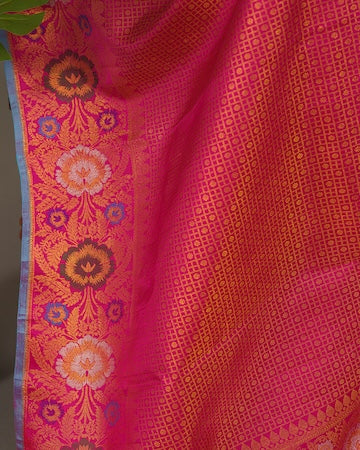 Berry pink Kanjeevaram saree with stitched blouse