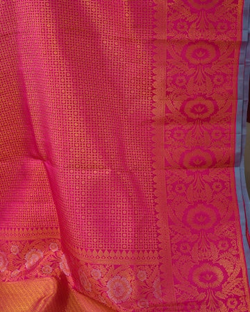 Berry pink Kanjeevaram saree with stitched blouse