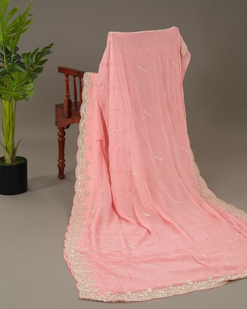 Blush peach embroidered georgette saree with blouse