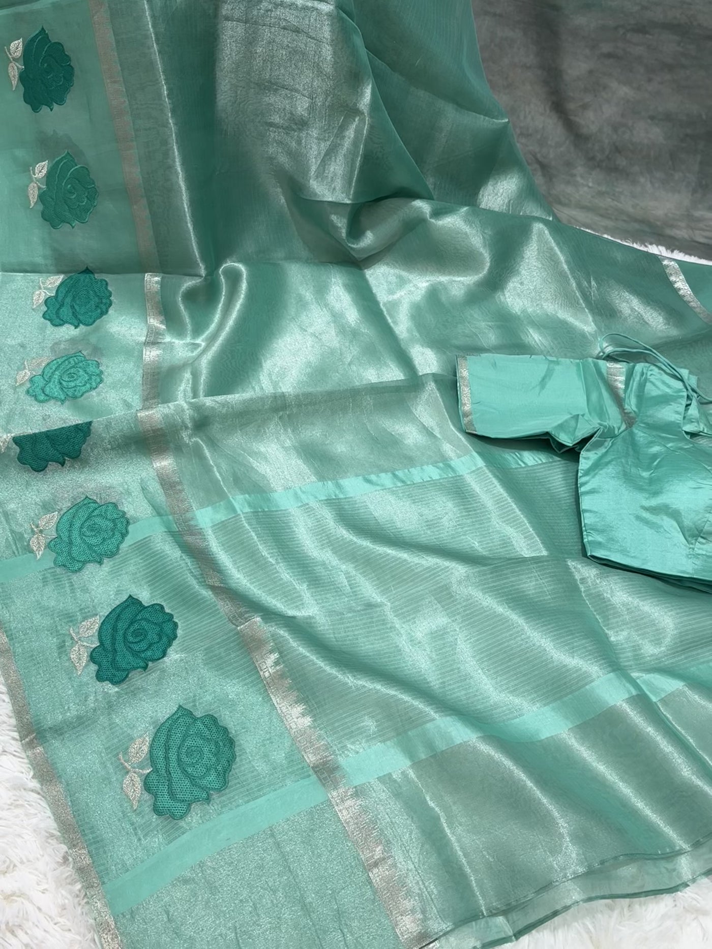 Teal Blue Banarasi Kora Silk Saree with Rose Motif Border & Matching Blouse