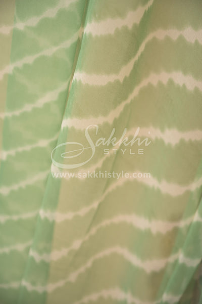 GREEN AND OFF WHITE LEHERIYA SAREE WITH STITCHED BLOUSE - Sakkhi Style
