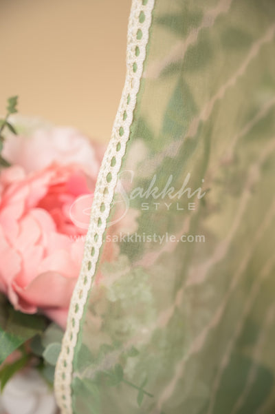 GREEN AND OFF WHITE LEHERIYA SAREE WITH STITCHED BLOUSE - Sakkhi Style